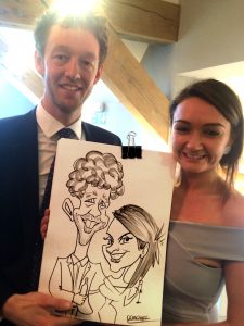 Wedding guests captured after the ceremony by walkabout caricaturist