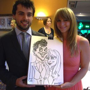 I do a LOT of weddings but NEVER get bored of them! Happy couple caricature drawn by walkabout caricaturist